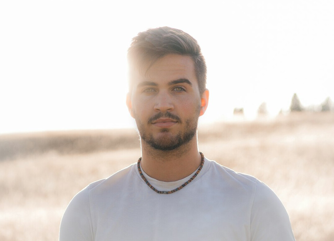 Confident man with short beard portrait