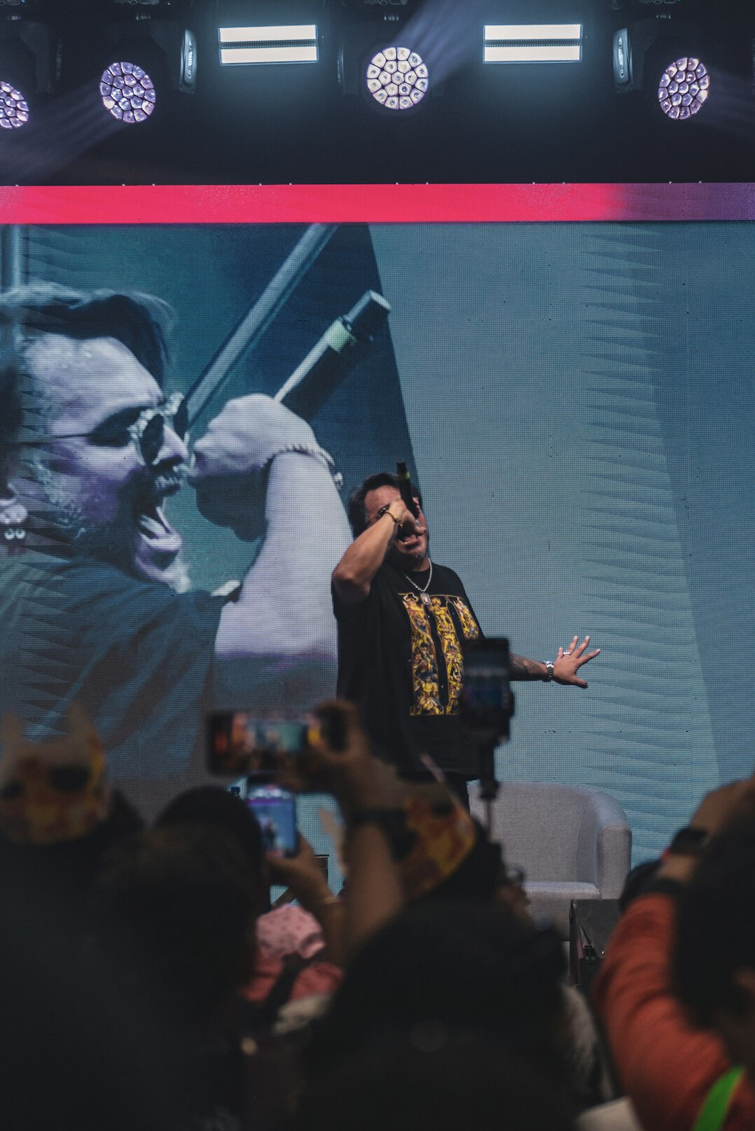 Speaker presenting to an audience