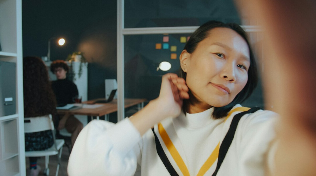 Professional woman smiling in an office