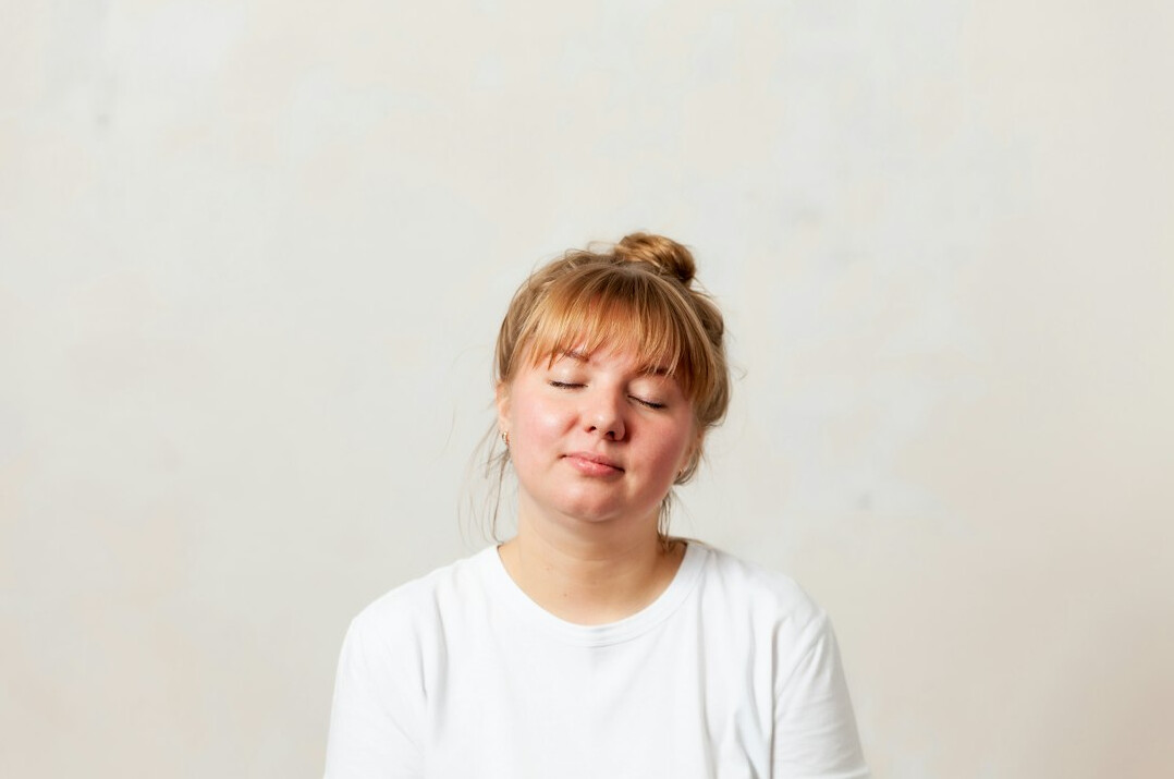 Young woman with calm expression portrait